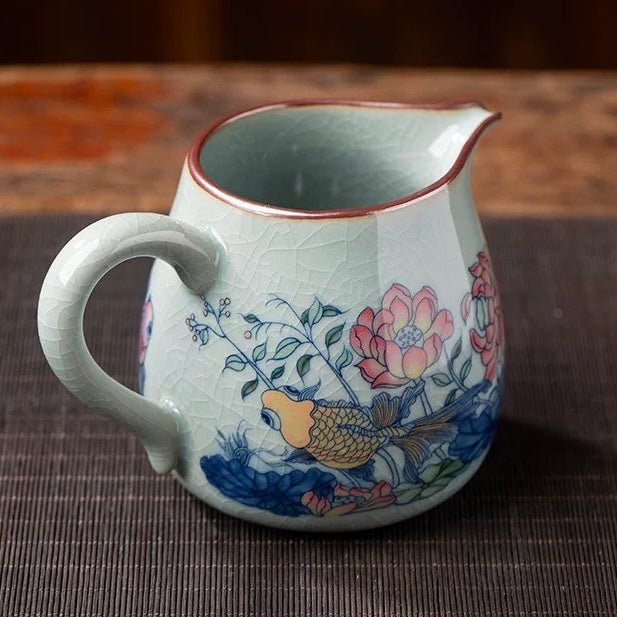 Jingdezhen Old Clay "Abundant Fortune" Fairness Pitcher - Chinese Tea Server—Traditional Chinese gongfu tea pitcher, handcrafted from Jingdezhen old clay with lotus & koi design. Evenly divide tea with authentic porcelain