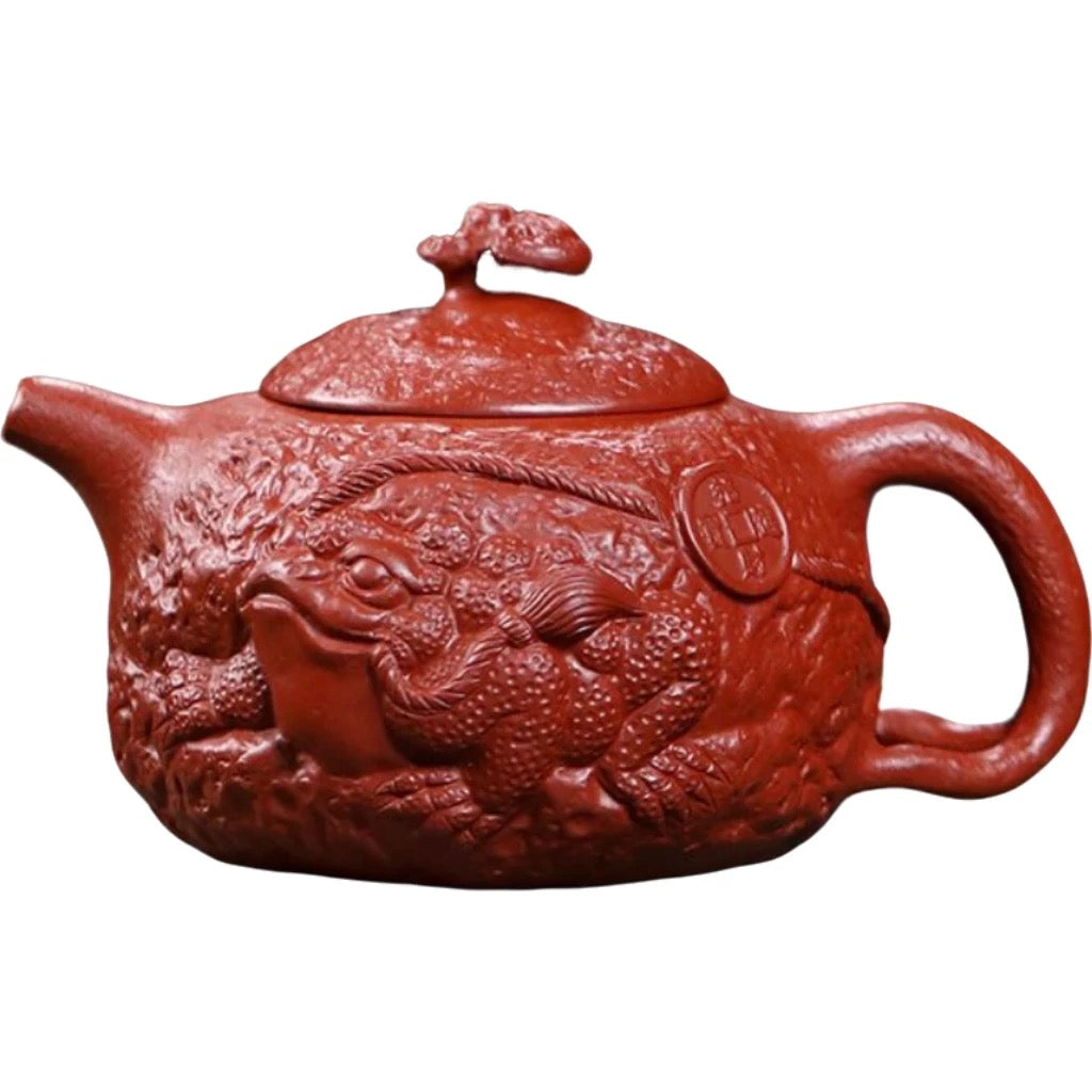 Handcrafted authentic Yixing teapot made from original Dahongpao clay. Features the lucky Jin Chan (money toad) design. Perfect for gongfu tea, daily use, and gifting.