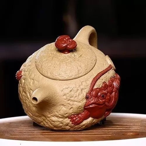 Handmade Yixing zisha teapot with Jin Chan (money toad) for wealth & good luck. Made from aged duan clay. Perfect for tea drinking, collection & gift.