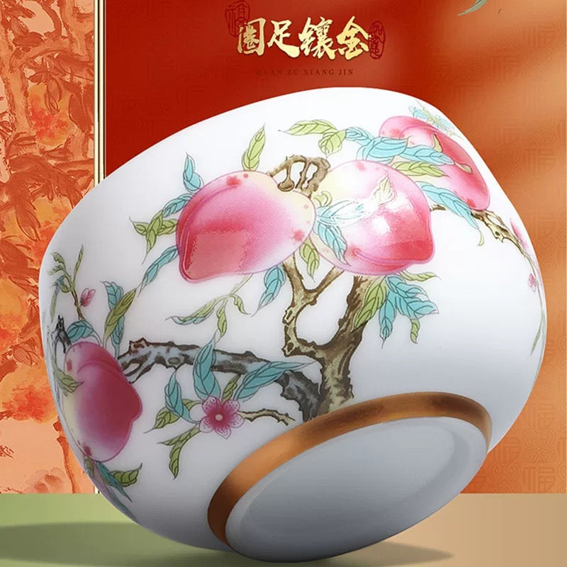 Peach Longevity Icy Jade Porcelain Tea Cup | Lucky Chinese Tea Bowl— Elegant icy jade porcelain tea cup with nine peaches pattern, enhancing tea aroma, symbol of longevity and good fortune for gifting.