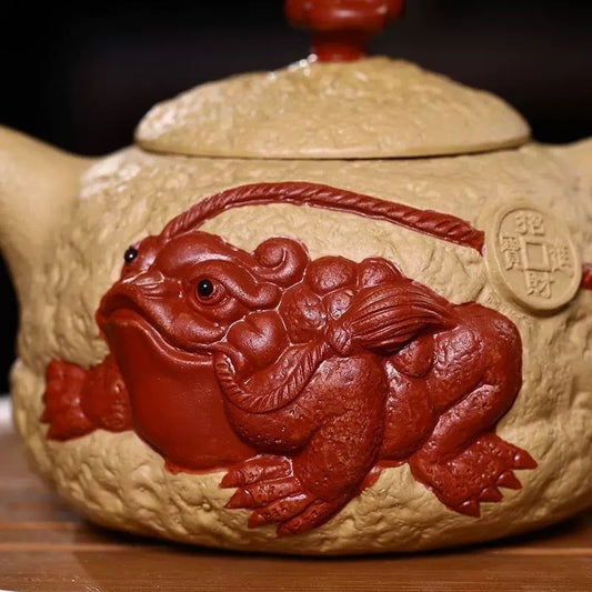 Handmade Yixing zisha teapot with Jin Chan (money toad) for wealth & good luck. Made from aged duan clay. Perfect for tea drinking, collection & gift.