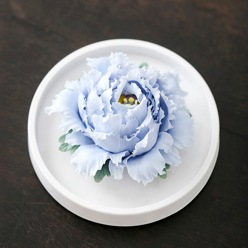 China's intangible cultural heritage, flowers made of handmade porcelain